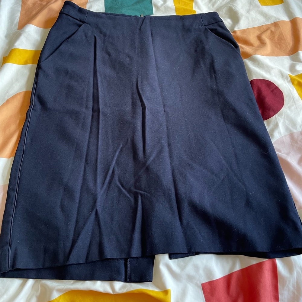 Navy pencil skirt with pockets and slit